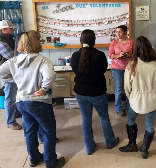 Kenzie debriefing volunteers